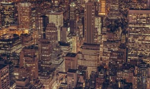 extended stay hotels NYC skyline at night