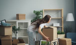 woman packing to move