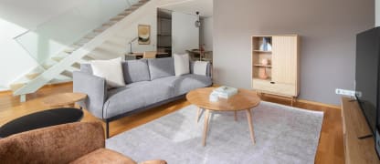 Living room of an open Blueground apartment in Paris