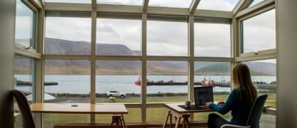 woman working remotely with a view