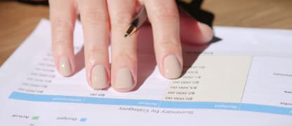 budget sheet being reviewed