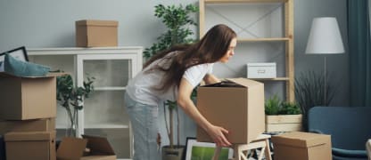 woman packing to move