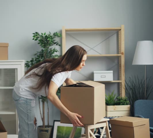 woman packing to move