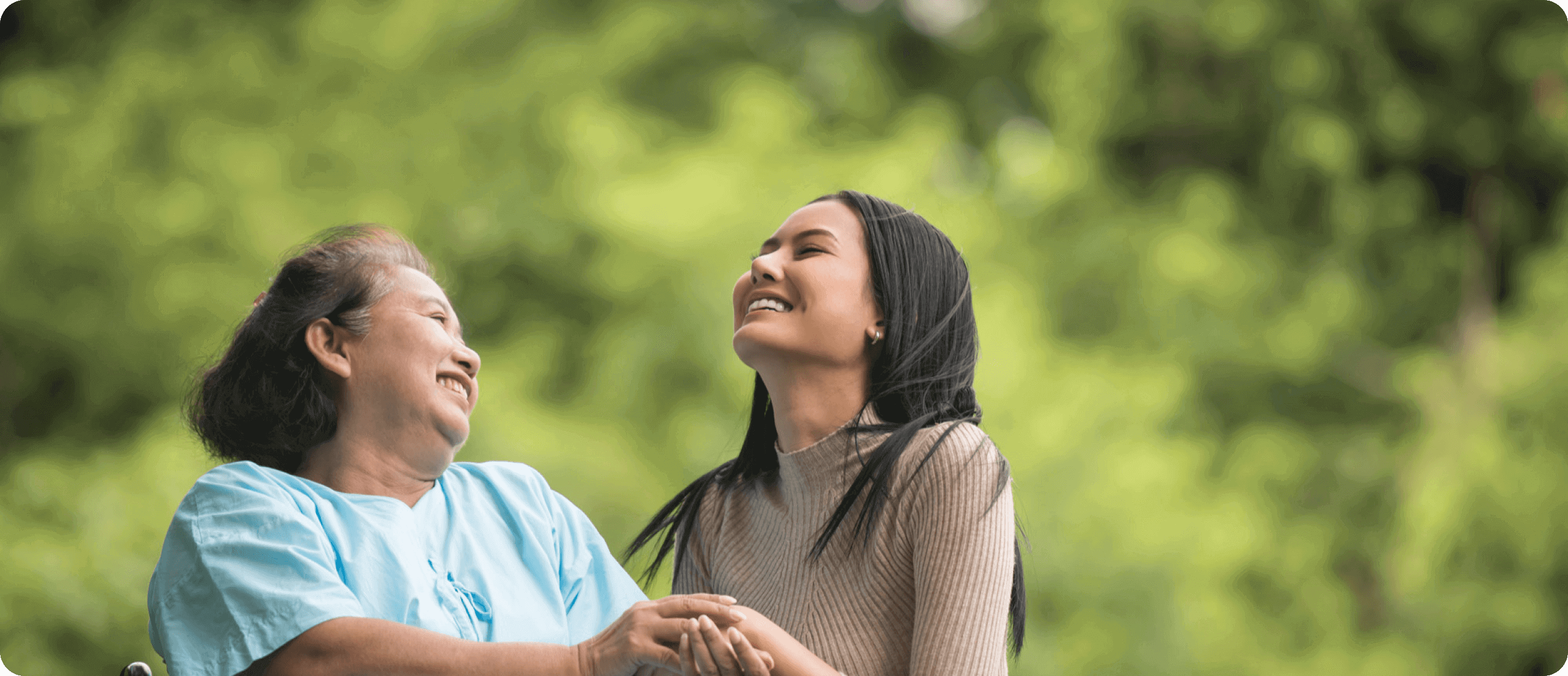 two woman laughing