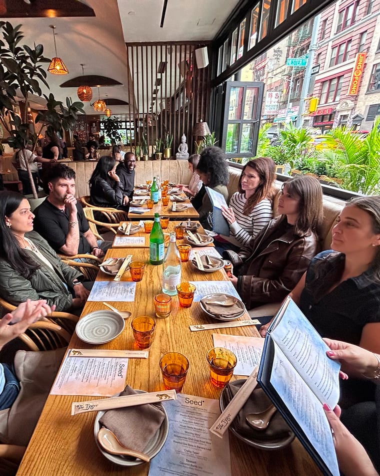 The Seed team at a group dinner during a New York City offsite