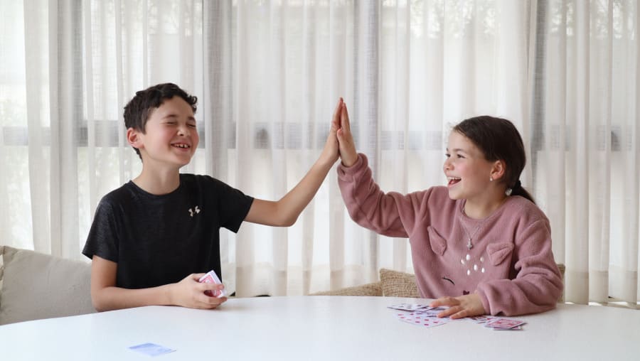 Kids high-fiving