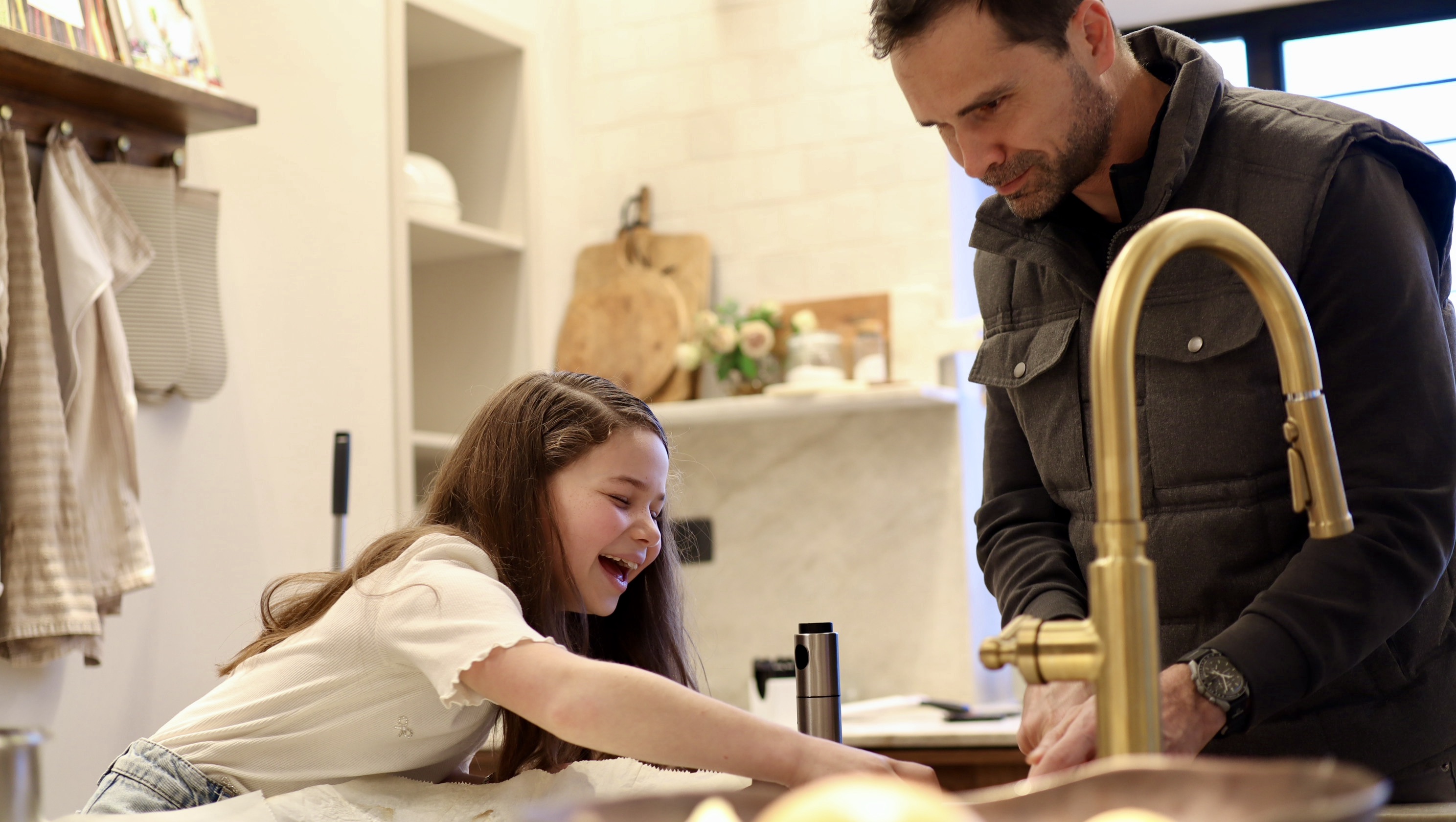 Dad and daughter cooking in the kitchen