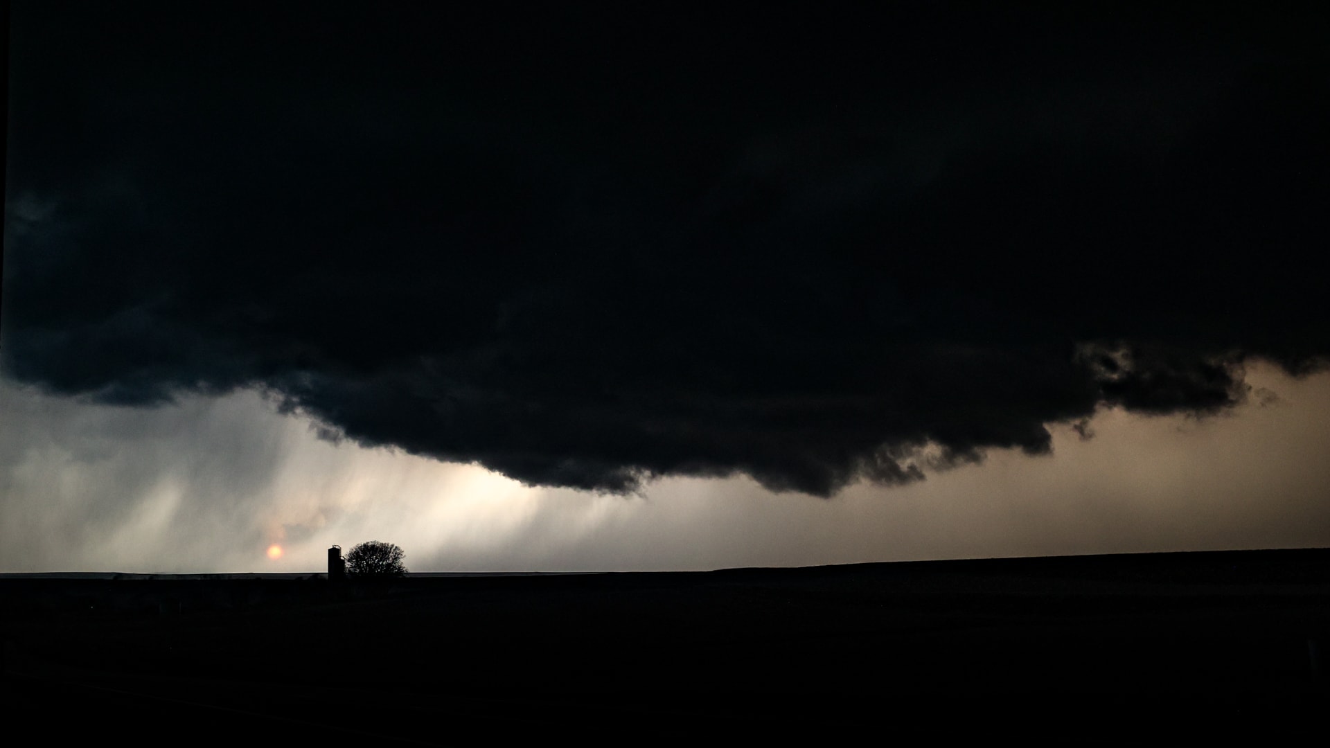 Image 16. Back-lit storm continues on