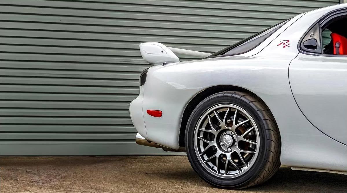 Rear section of a white Mazda RX-7 classic car