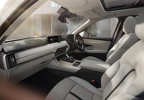 Interior view of the Mazda CX-60 SUV with an off-white trim