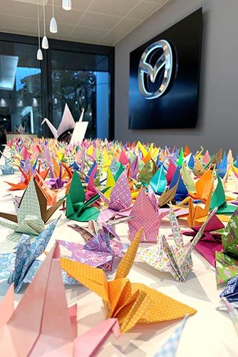 Donated paper cranes organised via Mazda