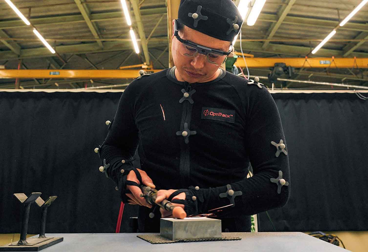 A Mazda technician in a motion-capture camera suit to measure muscle use, body-weight distribution, exertion, posture, arm angle and line-of-sight eye movements.
