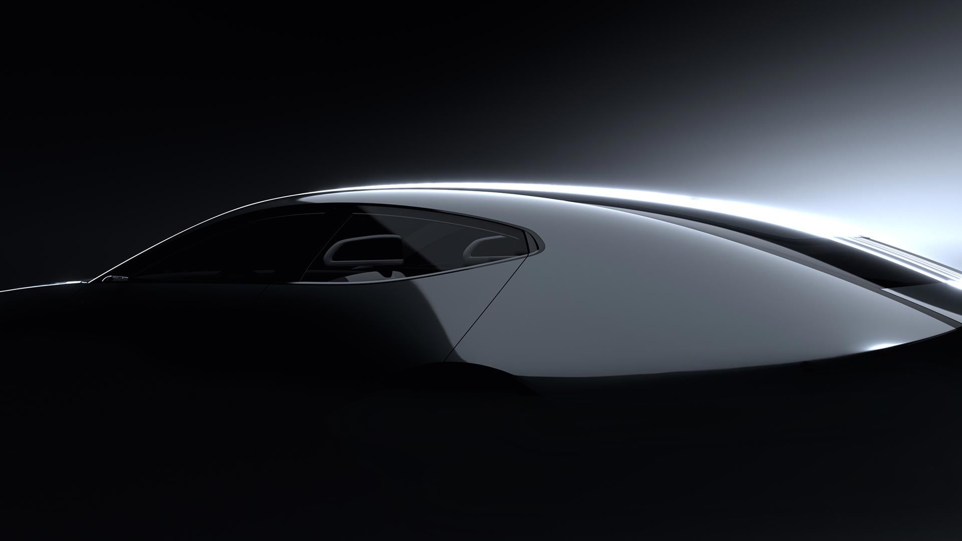 Artistic silhouette of a black Mazda Vision Model concept car on a lack background