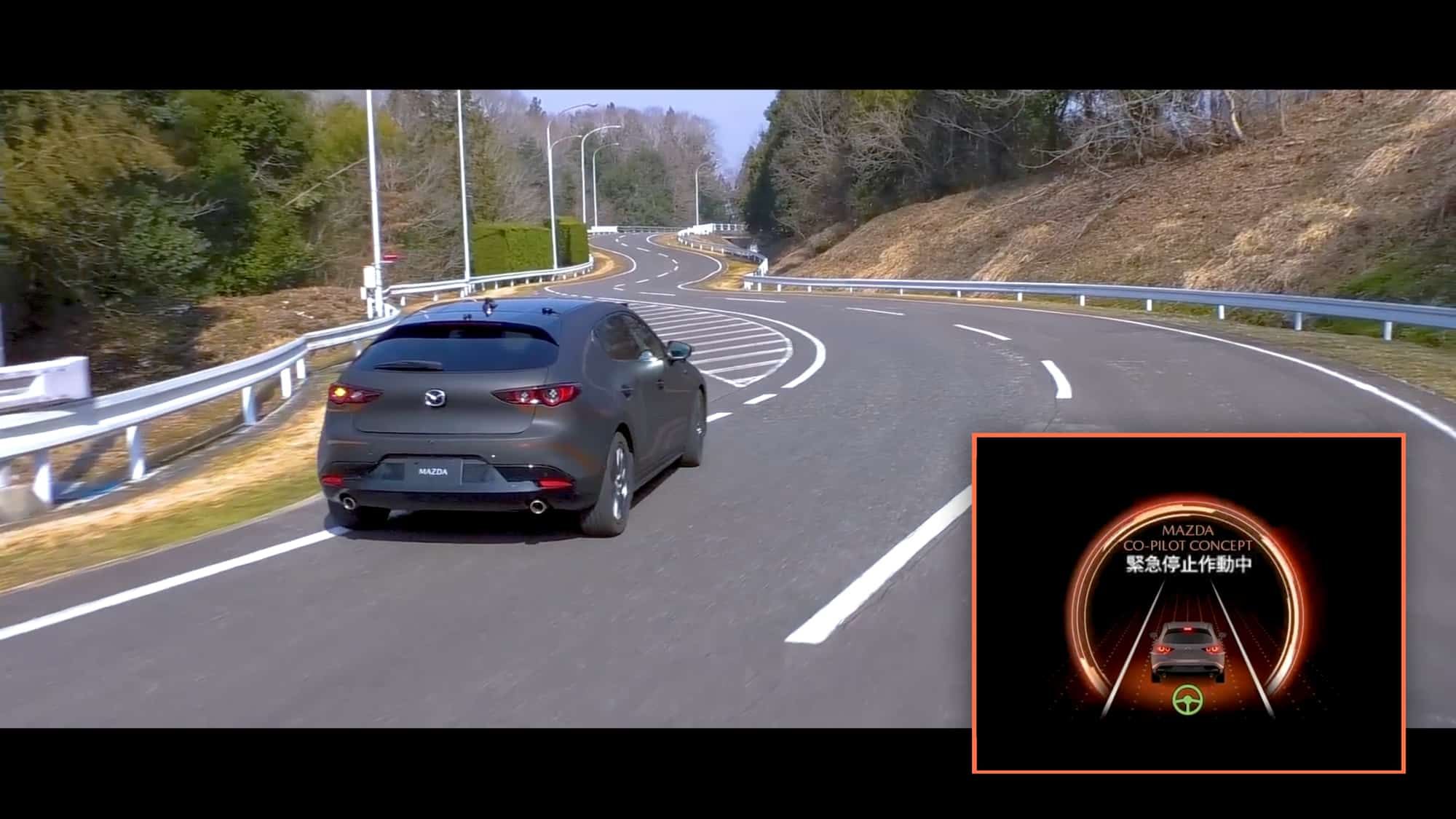 Close up of centre touchscreen of a Mazda car highlighting Mazda Co-pilot driver safety assistance systems