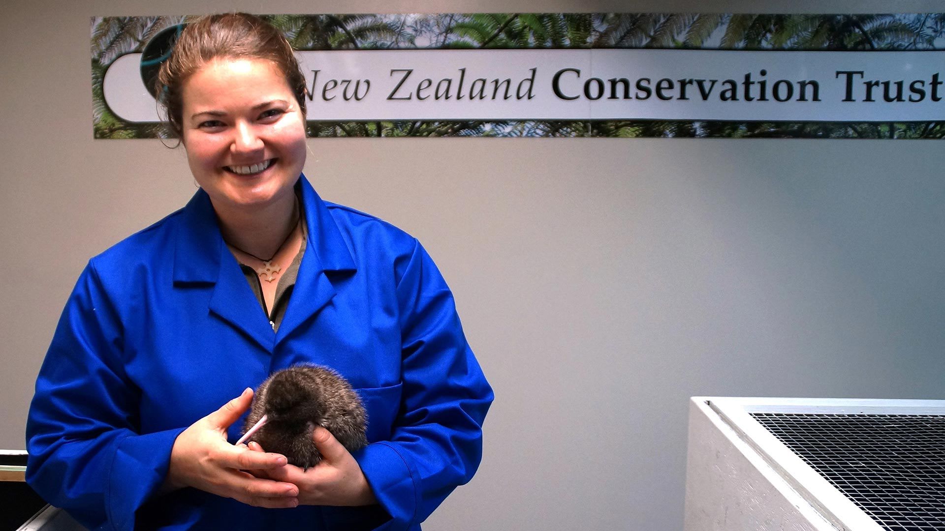 Woman from the New Zealand Conservation Trust posing for a photo