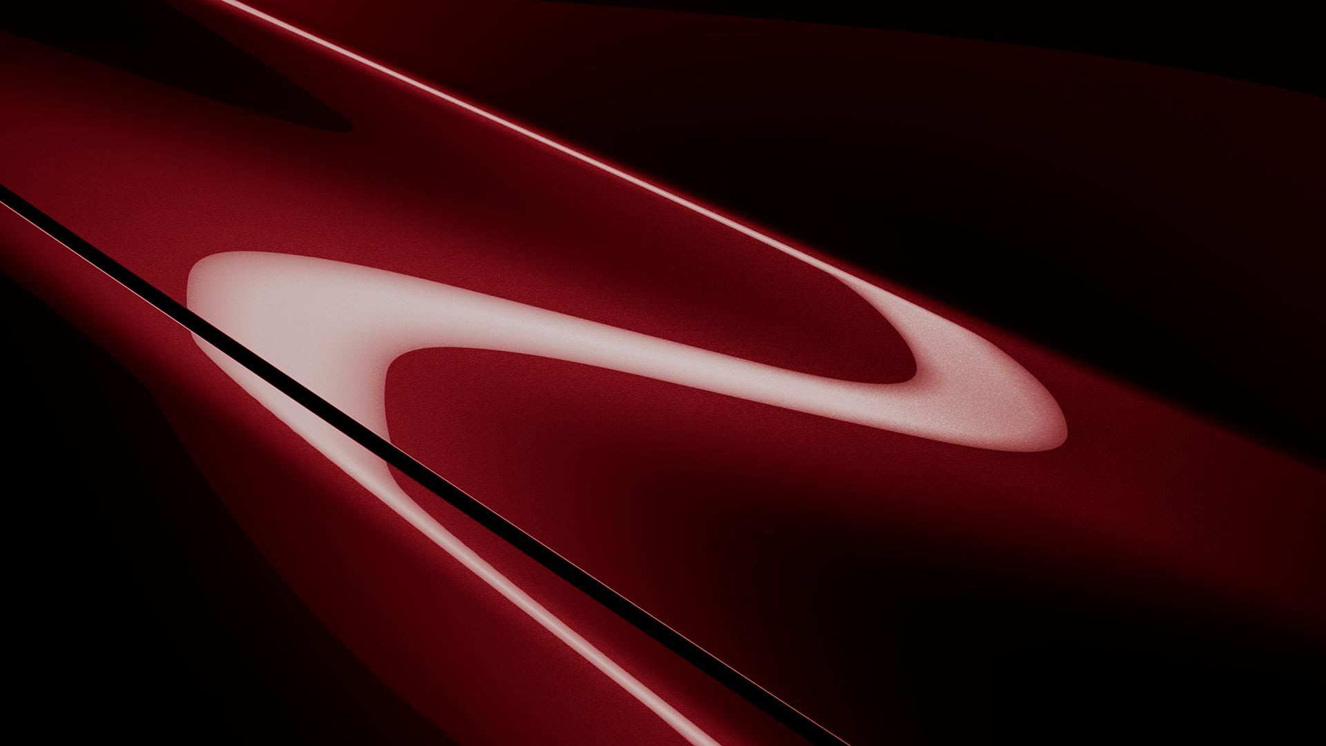 Artistic close up image of Artisan Red paint on a Mazda car
