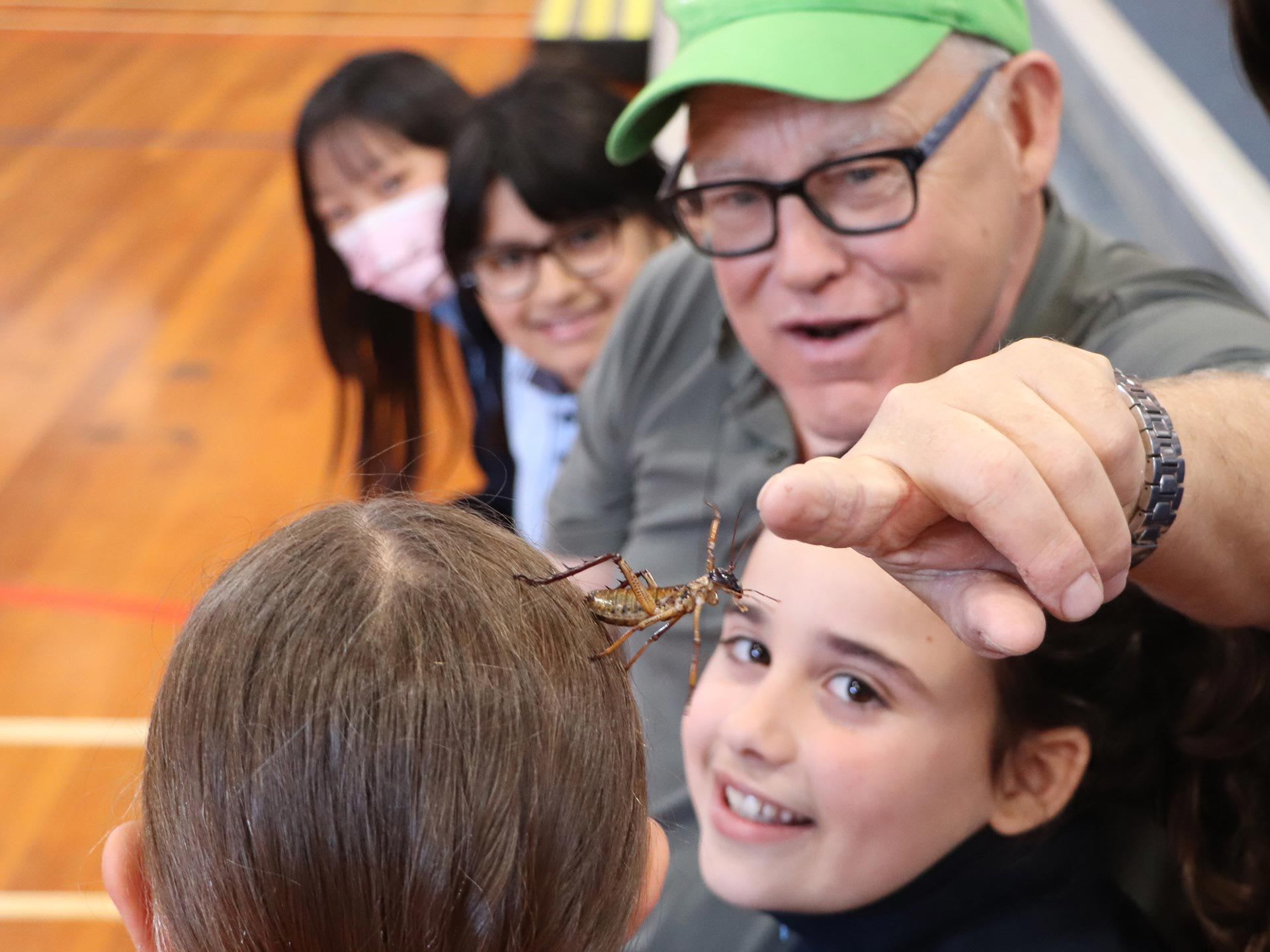 Ruud “the Bugman” Kleinpaste showing students at Glendowie School in Auckland a bug