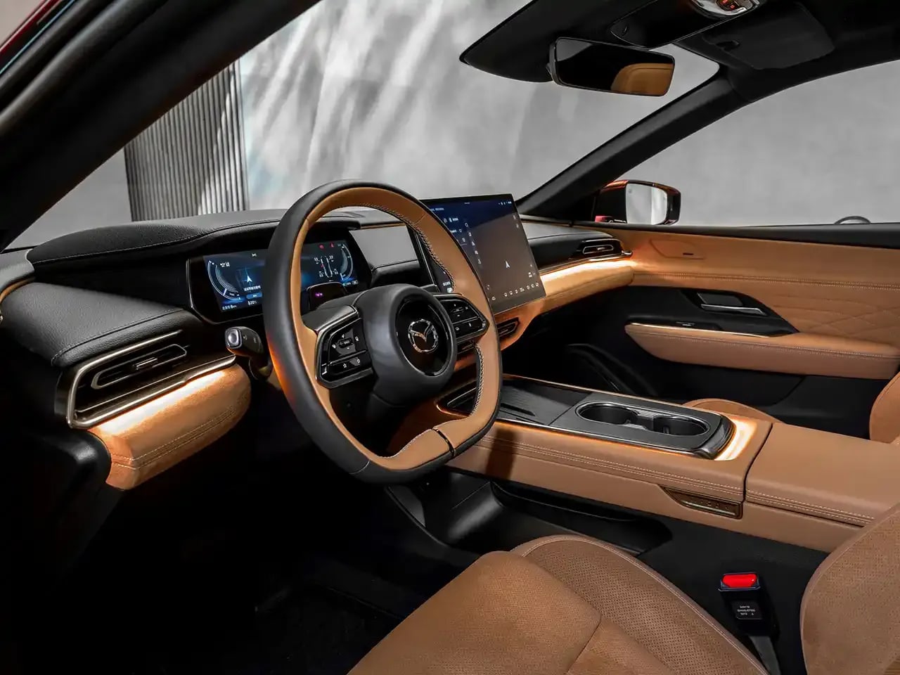 Brown interior and dashboard of a fully electric Mazda 6e