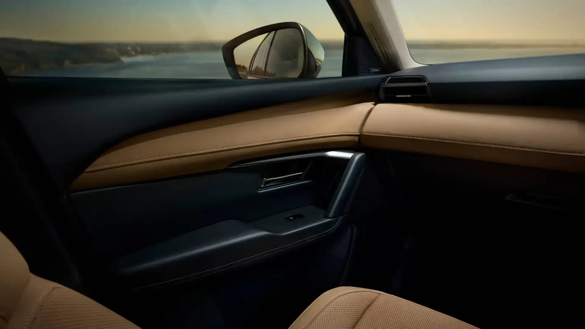 Close up of the premium tan leather details inside the cabin of a Mazda CX-5 SUV