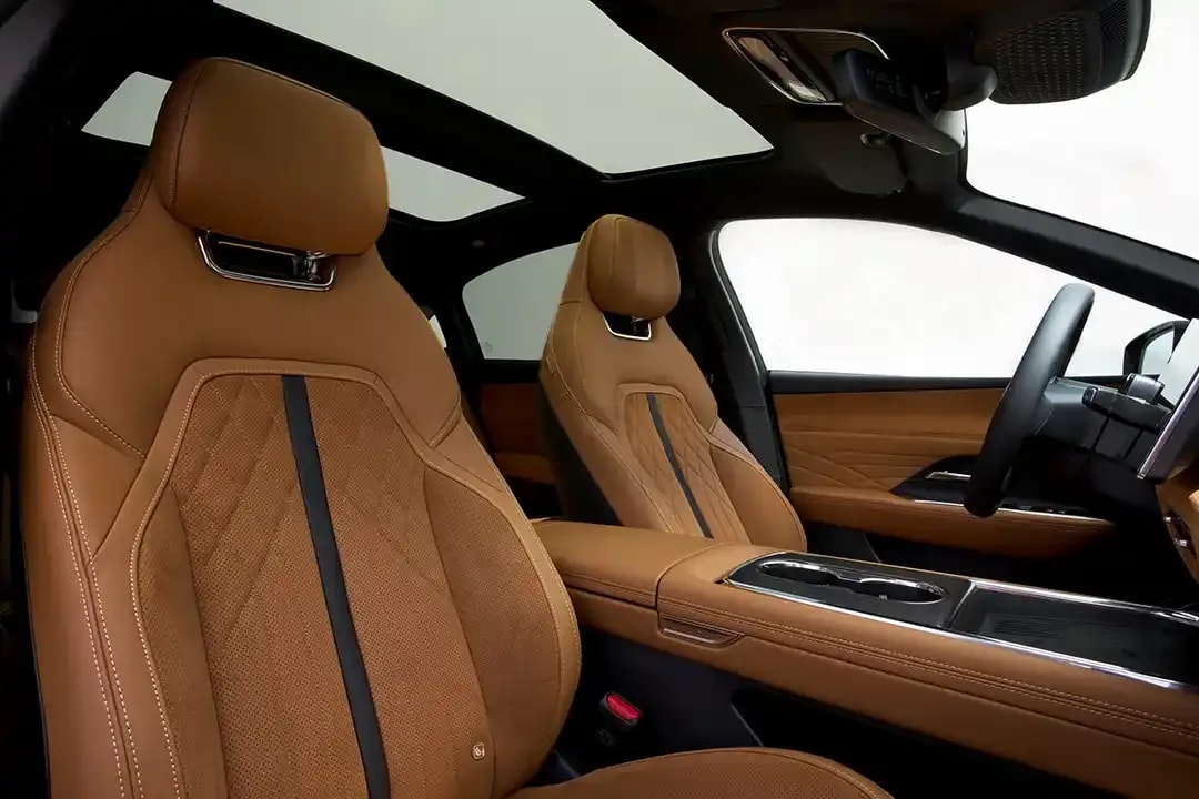 Tan alcantara front seats of the Mazda 6e electric car