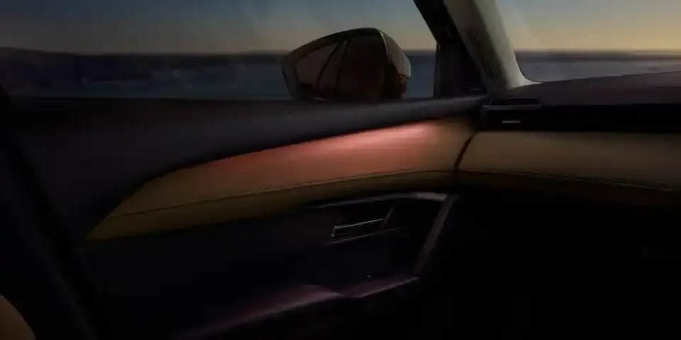 Close up of the interior front door panel with ambient lighting on the Mazda CX-5 SUV