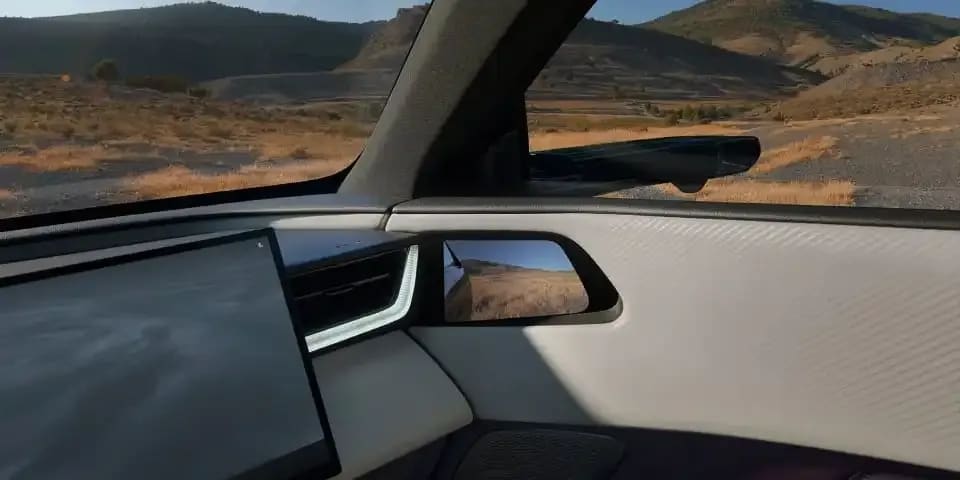 Close up of the digital mirror display in the front door panel of the all-electric Mazda CX-6e SUV