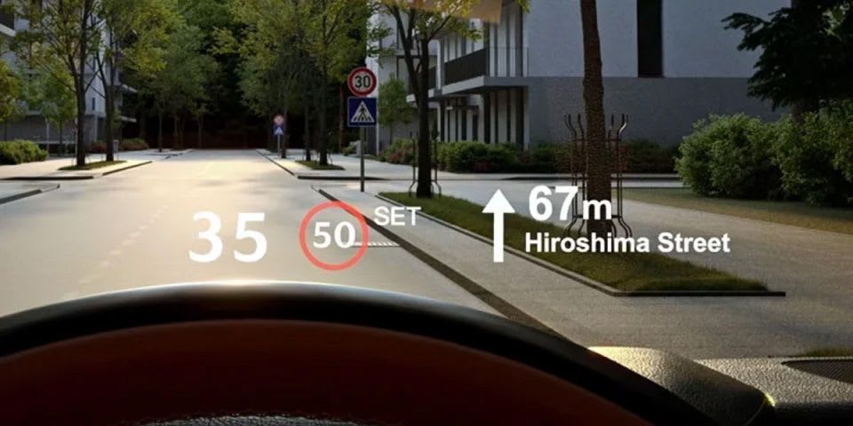 Large heads-up display seen looking through the windscreen of an all-electric Mazda 6e hatchback