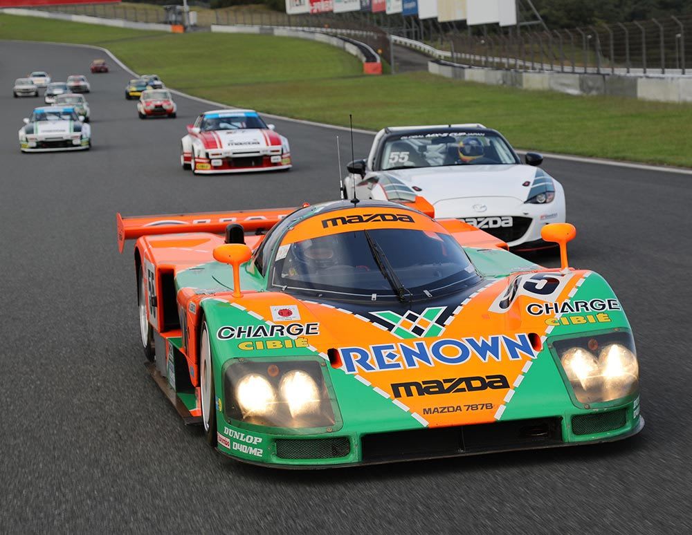 Mazda 787B race car leading its competitors on track at the 1991 24 Hours of Le Mans on its way to victory