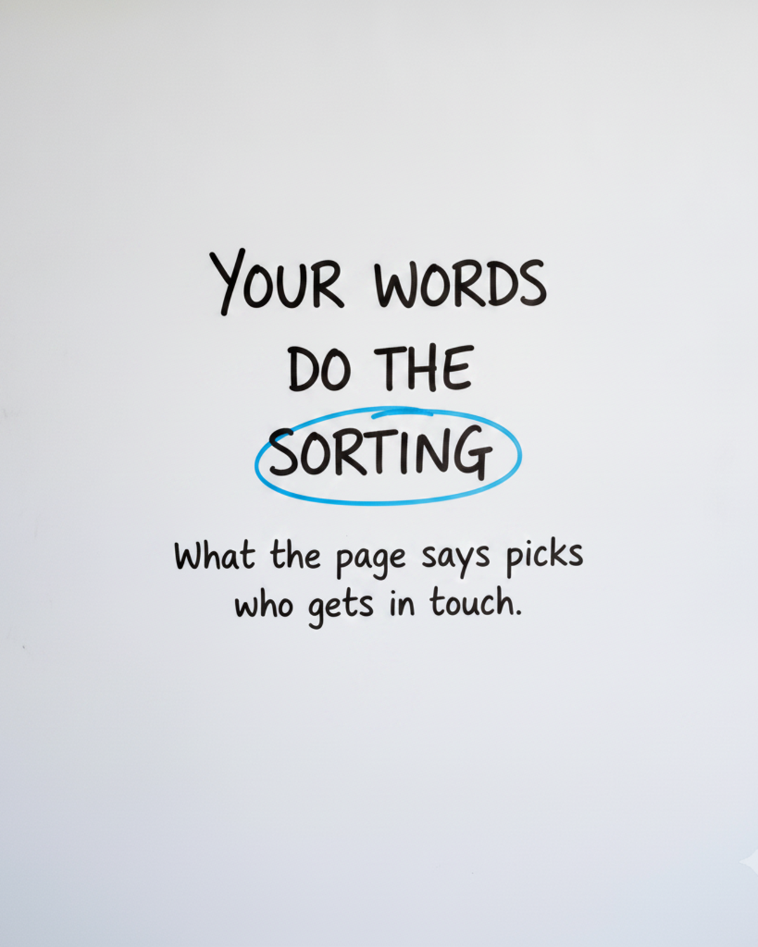 Whiteboard with the words Your words do the sorting written in black marker, with the word sorting circled in blue