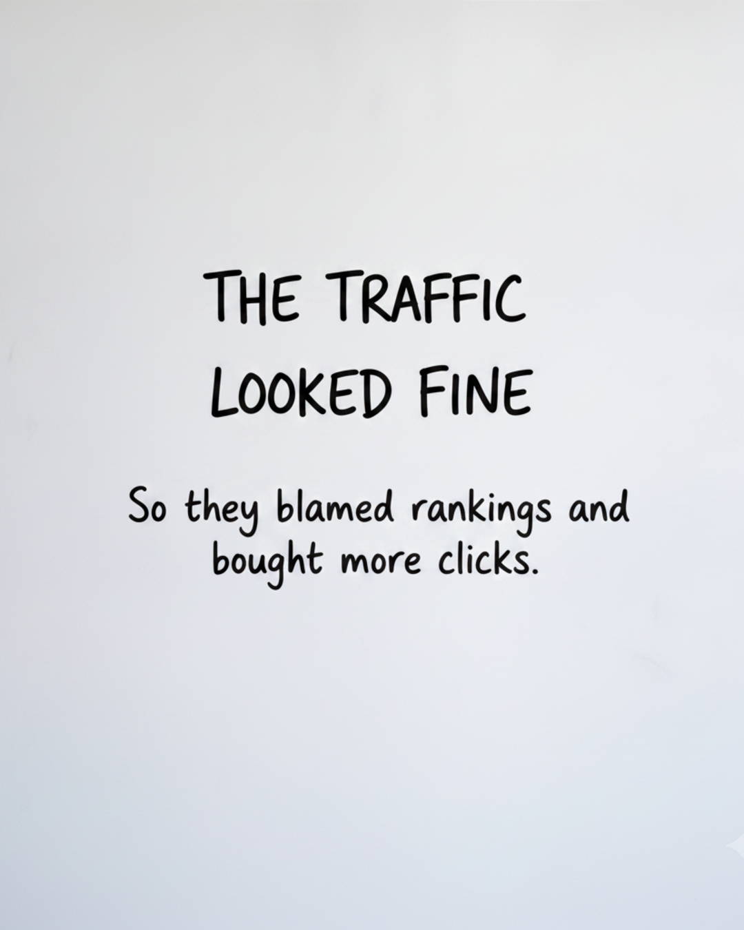 Whiteboard with the words The traffic looked fine written in black marker
