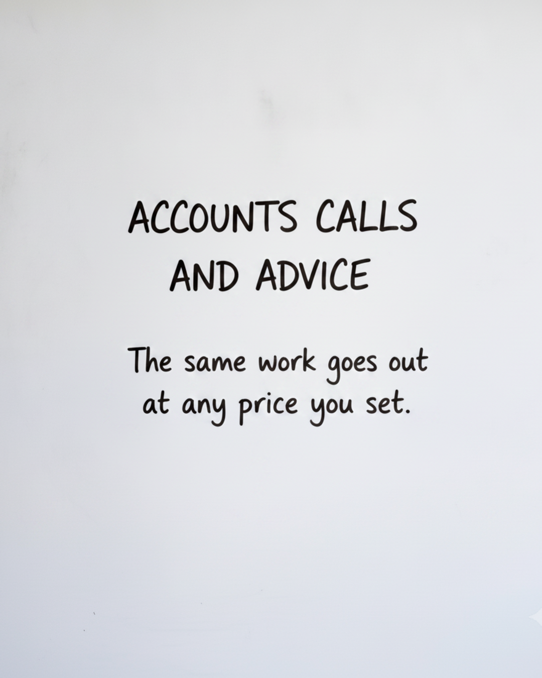Whiteboard with the words ACCOUNTS CALLS AND ADVICE written large in black marker