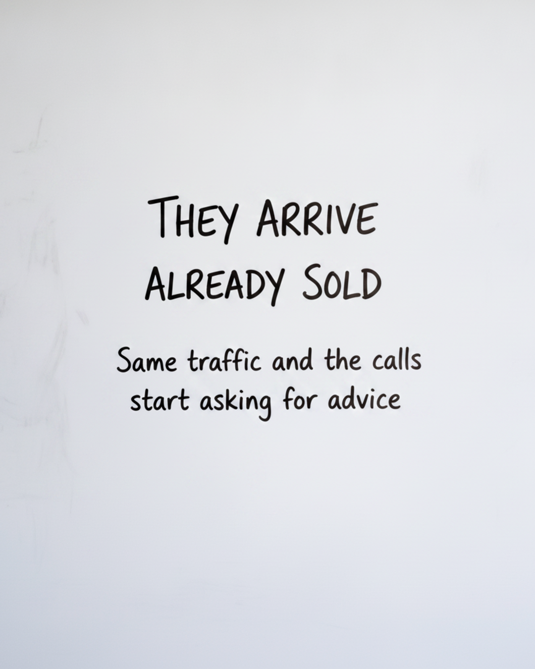 Whiteboard with the words They arrive already sold written in black marker