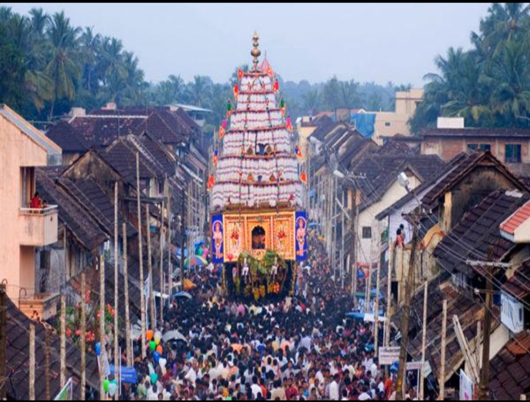 Car festival (ratholsavam) procession through an agraharam street in the Palakkad region.