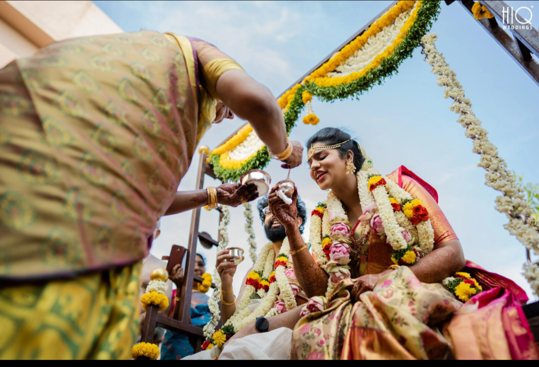 During the oonjal, older women of the family feed the couple milk and banana.