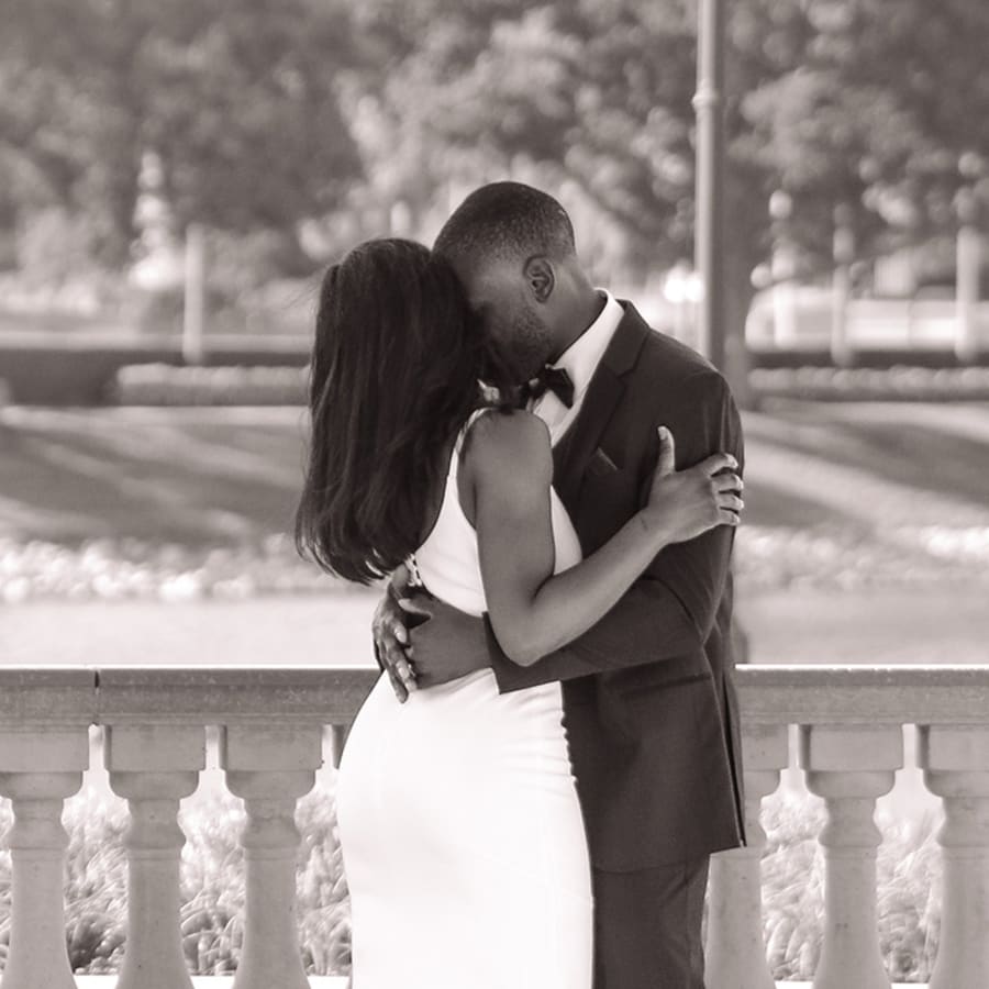 A married couple kissing, close up
