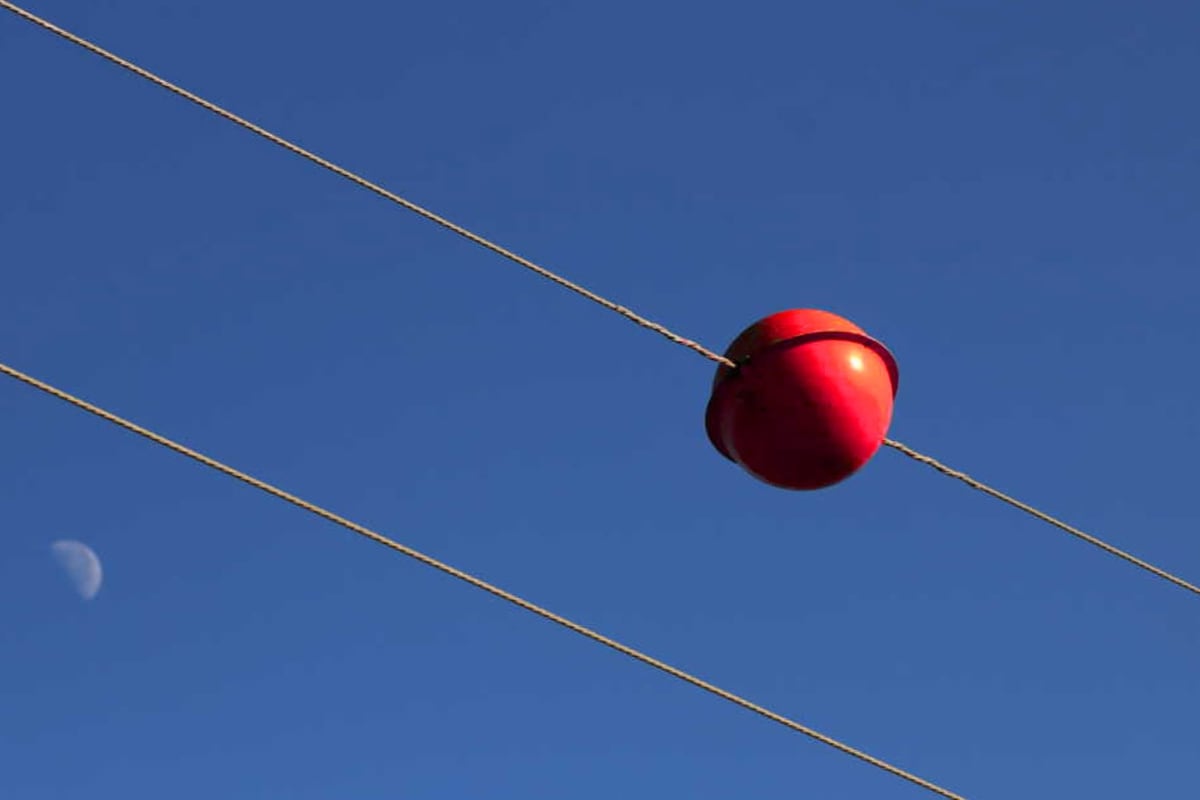 Why Red Spheres on Power Lines Are a Crucial Aviation Safety Innovation