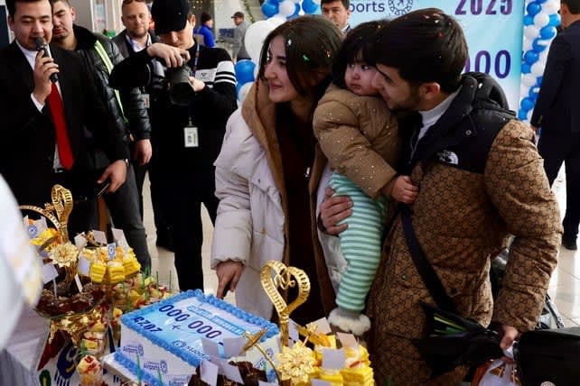 Which Passenger Marked the 15 Million Milestone for Uzbekistan Airports at Karshi?