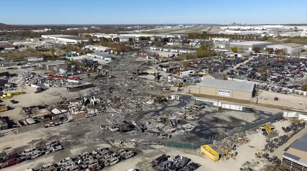 Dramatic photos of dommed UPS plane show the aircraft on fire, engine flying off