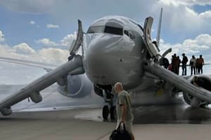 Why Do Passengers Grab Bags During Emergency Evacuations? Airlines Launch Study.