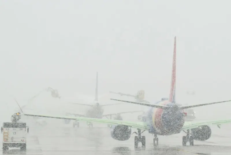 Snowstorm Halts Denver Airport, Causing Over 1,500 Delays & Cancellations