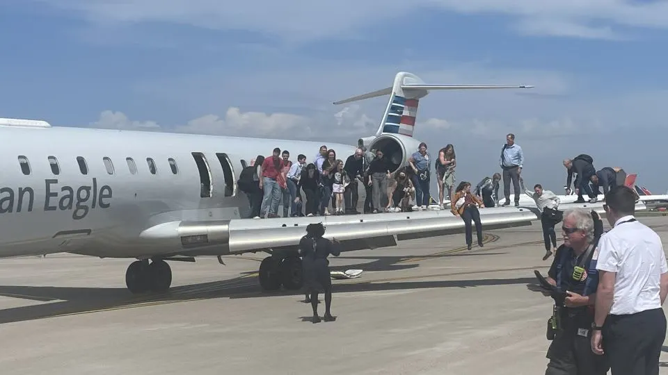 American Eagle Flight 5318 Evacuates After Cabin Smoke