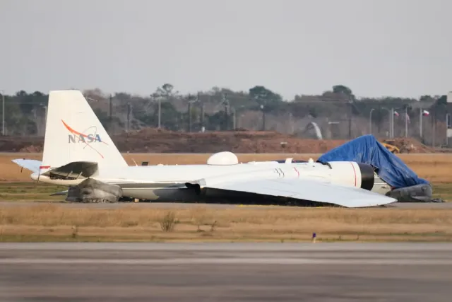 NASA WB-57 Research Plane Slides on Runway After Landing Gear Failure in Texas.