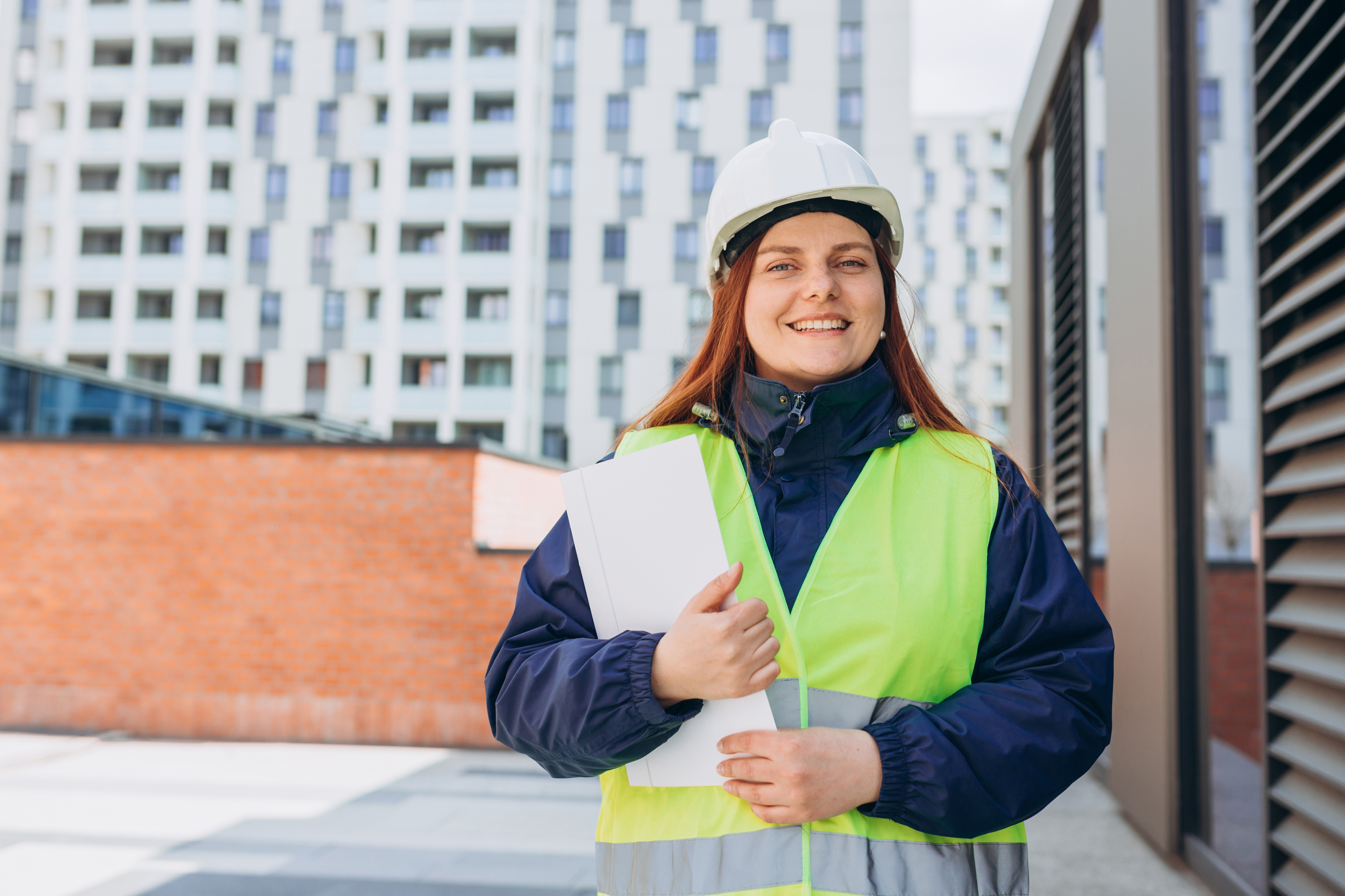 Female engineer in hard hat and safety vest