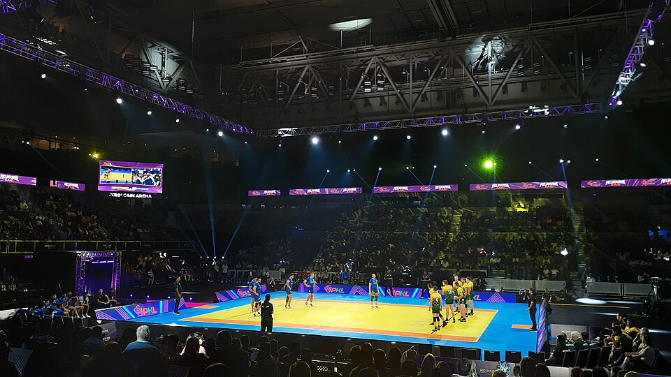 Kabaddi match in progress on a professional court — the indigenous Indian contact sport administered nationally by the Amateur Kabaddi Federation of India (AKFI)