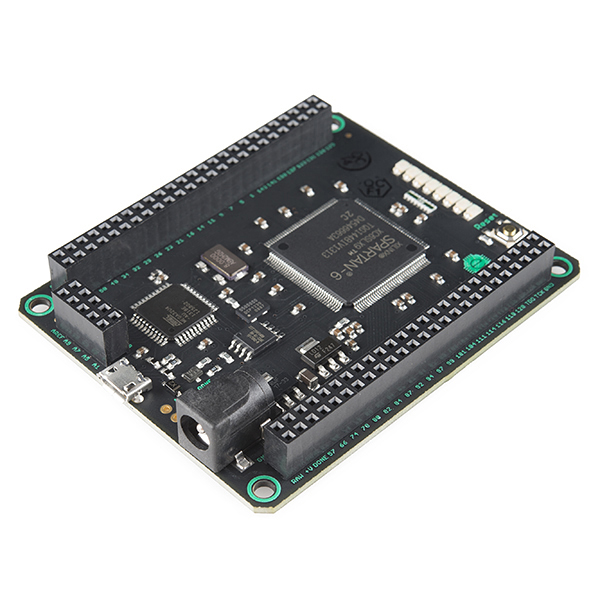 An FPGA development board with a Xilinx Spartan-6 chip at its centre, ringed by header pin rows and a USB connector