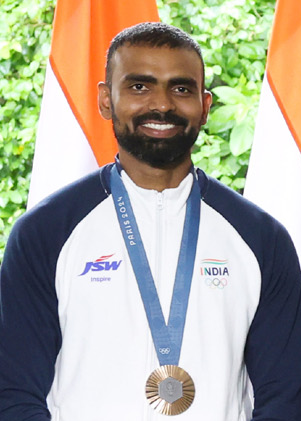 Hockey goalkeeper P. R. Sreejesh in India team kit wearing his Paris 2024 Olympic bronze medal