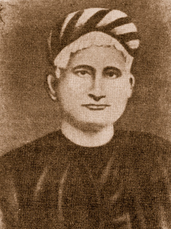 Sepia portrait of the Bengali novelist Bankim Chandra Chattopadhyay wearing a striped turban and a dark jacket