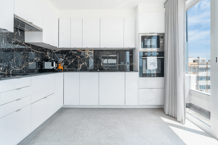 Modern white apartment kitchen