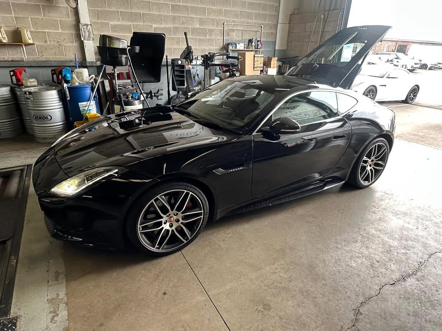 Black Jaguar F-Type in the Mitsiland MOT bay