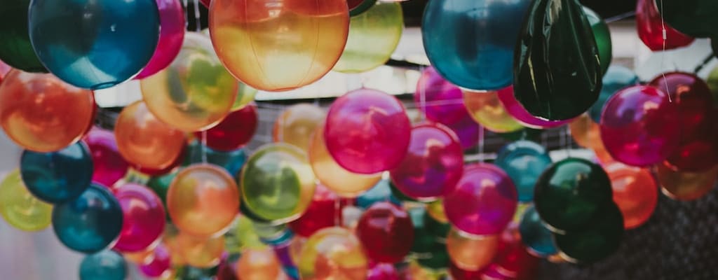 The balloon slowly goes up into the sky.